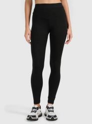 Legginsy treningowe bawełniane damskie czarne 4F Czarny XS. Czarne legginsy 4f, bez wzorów, z bawełny. Za 79.99 zł.