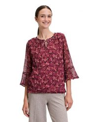 CARTOON Bluzka w kolorze czerwonym rozmiar: 36. Czerwone bluzki Cartoon, bez wzorów, bez kołnierzyka, bez ramiączek. Za 104.99 zł.