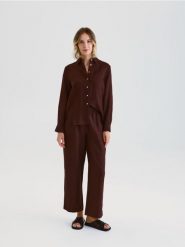 Lniana koszula - brązowy. Brązowe koszule Reserved, l, bez wzorów, z tkaniny, bez kołnierzyka, bez ramiączek. Za 149.99 zł.