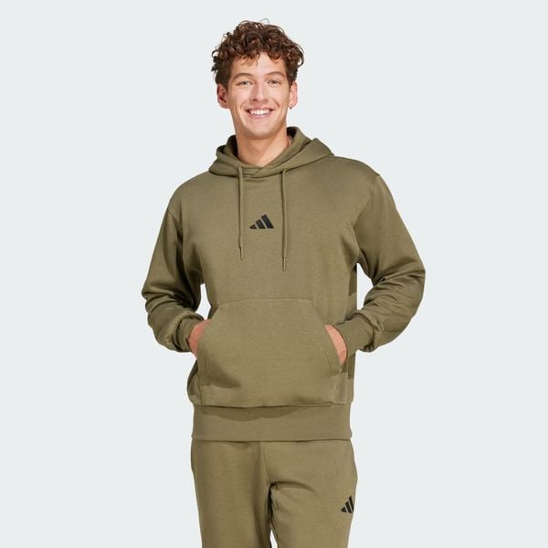 Bluza polarowa Essentials Feelcozy. Czarne bluzy z kapturem adidas, m, bez wzorów, z bawełny, z kapturem, trekkingowe. Za 219.00 zł.