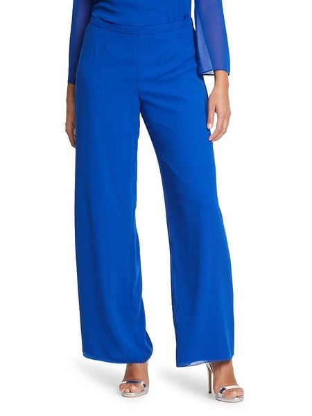 Vera Mont Spodnie w kolorze niebieskim rozmiar: 38. Niebieskie spodnie materiałowe Vera Mont, bez wzorów, z materiału. Za 92.21 zł.