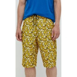 Converse szorty kolor żółty wzorzyste. Żółte szorty Converse, bez wzorów, z tkaniny. W wyprzedaży za 249.99 zł.