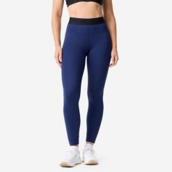 Legginsy fitness damskie Domyos. Niebieskie legginsy DOMYOS, bez wzorów, z elastanu, eleganckie. Za 119.99 zł.