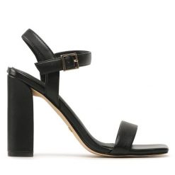 Sandały Guess. Czarne sandały Guess, z aplikacjami, bez obcasa, na słupku, bez zapięcia. Za 319.99 zł.