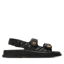 Sandały Nine West. Czarne sandały Nine West, bez wzorów, bez obcasa, na płaskiej podeszwie, bez zapięcia. Za 279.99 zł.