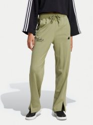 Adidas Spodnie dresowe Signature Graphic JI6524 Zielony Loose Fit. Zielone spodnie dresowe adidas, bez wzorów, z bawełny. Za 169.99 zł.