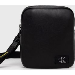 Calvin Klein Jeans saszetka kolor czarny. Czarne nerki i saszetki Calvin Klein Jeans, bez wzorów, z jeansu, bez dodatków. Za 399.99 zł.