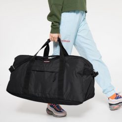 Dorosły Torba Podróżna Eastpak Terminal Plus Czarny. Czarne torby podróżne Eastpak, bez wzorów, z materiału. W wyprzedaży za 312.50 zł.
