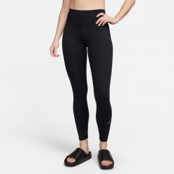 Legginsy Kobieta Nike High-Waisted Leffing czarny. Czarne legginsy sportowe Nike, l, bez wzorów, z elastanu, na fitness i siłownię. Za 329.99 zł.