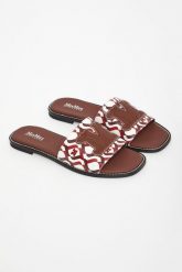 Klapki damskie skórzane Dovere MAX MARA BEACHWEAR. Klapki Max Mara Beachwear, bez wzorów, bez obcasa, bez zapięcia. Za 979.00 zł.