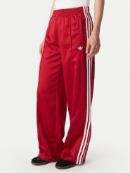Adidas Spodnie dresowe Satin Sst Loose Trackpant KS7338 Czerwony Relaxed Fit. Czerwone spodnie dresowe adidas, bez wzorów, z dresówki. Za 349.99 zł.