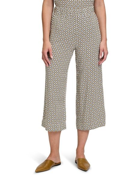 CARTOON Spodnie w kolorze beżowym rozmiar: 44. Brązowe spodnie materiałowe Cartoon, bez wzorów, z materiału. Za 70.08 zł.