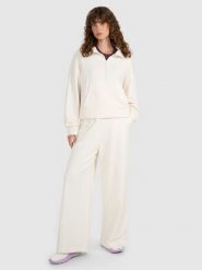 4F Spodnie dresowe z szerokimi nogawkami damskie - beżowe S. Brązowe spodnie dresowe 4f, bez wzorów, z bawełny. W wyprzedaży za 139.99 zł.