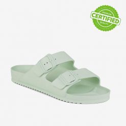 Klapki damskie Coqui z anatomiczną wkładką. Zielone klapki Coqui, bez wzorów, bez obcasa, na płaskiej podeszwie, bez zapięcia. Za 125.99 zł.
