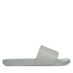 Klapki Calvin Klein. Szare klapki Calvin Klein, bez wzorów, bez obcasa, bez zapięcia. Za 139.99 zł.