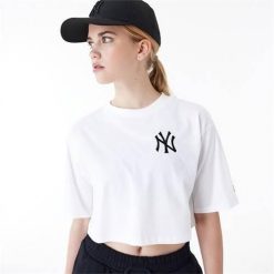 Koszulka sportowa damska New Era Neyyan. Białe t-shirty sportowe New Era, s, bez wzorów, z bawełny, bez ramiączek. Za 268.00 zł.