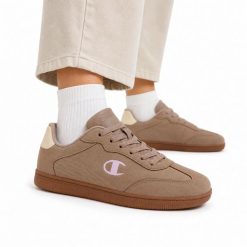 Buty damskie sportowe do chodzenia Champion PRESTIGE MS. Brązowe buty treningowe Champion, bez wzorów, z jeansu, bez zapięcia, trekkingowe. Za 129.00 zł.