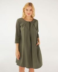Zielona sukienka mini. Zielone sukienki Unisono, l, bez wzorów, z materiału, bez kołnierzyka, bez ramiączek, mini. Za 199.00 zł.