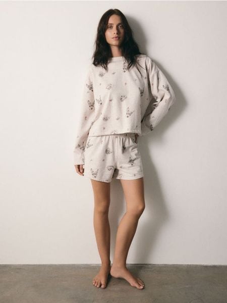 Wzorzysta piżama dwuczęściowa - kremowy. Białe piżamy Reserved, l, bez wzorów, z bawełny, bez kołnierzyka, bez ramiączek. Za 139.99 zł.