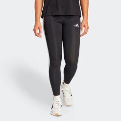 Legginsy fitness damskie ADIDAS. Czarne legginsy adidas, bez wzorów, z bawełny, sportowe, długie. Za 99.99 zł.