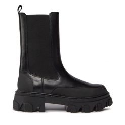 Sztyblety DKNY. Czarne botki DKNY, bez wzorów, bez obcasa, na płaskiej podeszwie, bez zapięcia. Za 739.99 zł.