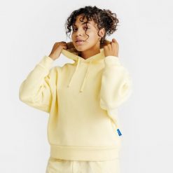 Bluza z kapturem damska Elementals. Żółte bluzy z kapturem Decathlon, s, bez wzorów, z bawełny, z kapturem. Za 179.99 zł.