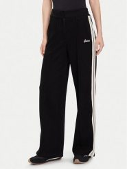 Guess Spodnie dresowe V5BB16 KCX52 Czarny Wide Leg. Czarne spodnie dresowe Guess, z aplikacjami, z dresówki. Za 279.99 zł.