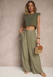 Ciemnozielone Spodnie o Szerokim Kroju High Waist Natoreia. Zielone jeansy Renee, bez wzorów, z jeansu, boho, z podwyższonym stanem. W wyprzedaży za 56.99 zł.