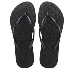 Klapki Havaianas Model 4000030 Kolor Czarny. Czarne klapki Havaianas, bez wzorów, z gumy, sportowe, bez obcasa, bez zapięcia. Za 71.99 zł.