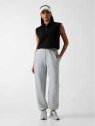 Guess Spodnie materiałowe 181395 Szary Classic Fit. Szare spodnie materiałowe Guess, z aplikacjami, z materiału. Za 294.99 zł.