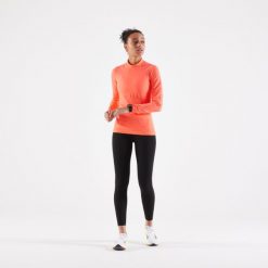Legginsy do biegania damskie Kiprun Run 900 Light. Czarne legginsy KIPRUN, bez wzorów, z elastanu, sportowe, długie. Za 149.99 zł.