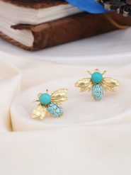 L'Atelier de Gaia Pozłacane kolczyki-wkrętki z turkusem i cyrkoniami rozmiar: onesize. Niebieskie kolczyki L'Atelier de Gaia, z cyrkonią, pozłacane. Za 43.99 zł.