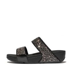 Sandały na koturnie z cekinami damskie FitFlop Lulu. Czarne sandały FIT FLOP, bez wzorów, z materiału, klasyczne, bez obcasa, na koturnie, bez zapięcia. Za 469.00 zł.