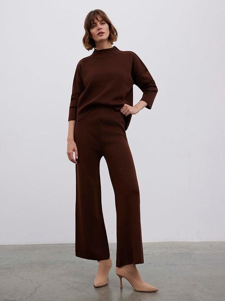 BGN Spodnie w kolorze brązowym rozmiar: 38. Brązowe spodnie materiałowe BGN, bez wzorów, z materiału. Za 126.95 zł.