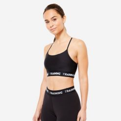 Stanik sportowy Decathlon. Czarne biustonosze sportowe DOMYOS, bez wzorów, z elastanu, na fitness i siłownię. Za 49.99 zł.