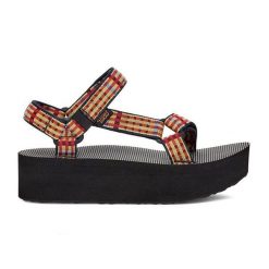 Kobiece sandały płaskie Teva Universal. Żółte sandały Teva, bez wzorów, bez obcasa, na płaskiej podeszwie, bez zapięcia. Za 340.00 zł.