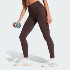 Legginsy treningowe Optime Workout Full Length. Brązowe bielizna termoaktywna damska adidas, bez wzorów, ze skóry, bez ramiączek. Za 259.00 zł.