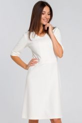 Elegancka sukienka dzianinowa trapezowa midi z dekoltem V ecru kremowa. Białe sukienki Sukienki.shop, do pracy, l, bez wzorów, z bawełny, biznesowe, bez kołnierzyka, bez ramiączek, midi, proste. Za 229.00 zł.