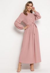 Ciemnoróżowa Rozkloszowana Sukienka Maxi z Plisowanym Dołem i Wiązanym Paskiem Nollira. Czerwone sukienki Born2be, bez wzorów, eleganckie, bez kołnierzyka, bez ramiączek, maxi, plisowane. W wyprzedaży za 104.99 zł.