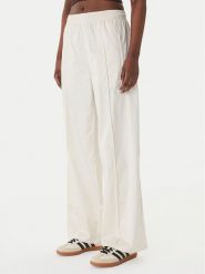 Adidas Spodnie dresowe Pearl Firebird KE3393 Écru Loose Fit. Spodnie dresowe adidas, bez wzorów, z dresówki. Za 349.99 zł.