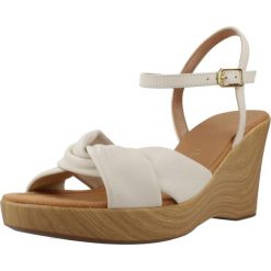 Sandały UNISA RAMIRO NTO Biały. Białe sandały Unisa, bez wzorów, ze skóry, sportowe, bez obcasa, bez zapięcia. Za 354.99 zł.