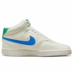 Obuwie Sportowe Damskie Nike 105. Białe buty treningowe Nike, bez wzorów, z materiału, bez zapięcia, do koszykówki. Za 221.52 zł.