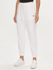 Tommy Jeans Spodnie dresowe Script DW0DW17771 Biały Relaxed Fit. Białe spodnie dresowe Tommy Jeans, bez wzorów, z bawełny. Za 249.99 zł.