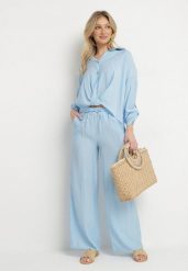 Jasnoniebieski Wiskozowy Komplet Oversize Koszula i Spodnie z Gumką w Talii Natilira. Niebieskie koszule Born2be, l, bez wzorów, z wiskozy, biznesowe, bez kołnierzyka, bez ramiączek. Za 199.99 zł.