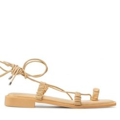 Sandały Tamaris. Żółte sandały Tamaris, bez wzorów, bez obcasa, na płaskiej podeszwie, bez zapięcia. Za 239.99 zł.