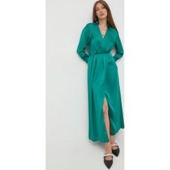 Pinko sukienka kolor zielony maxi rozkloszowana. Zielone sukienki Pinko, bez wzorów, z tkaniny, bez kołnierzyka, bez ramiączek, maxi, rozkloszowane. Za 1,689.90 zł.