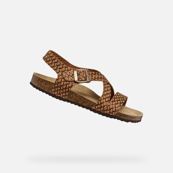 Sandały GEOX D BRIONIA Brąz. Brązowe sandały Geox, bez wzorów, ze skóry, bez obcasa, bez zapięcia. Za 263.99 zł.
