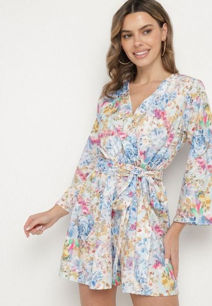 Jasnoniebieski Kombinezon o Kopertowym Kroju z Wiązanym Paskiem i Szerokimi Rękawami Tefonea. Niebieskie sukienki Born2be, na spotkanie biznesowe, m, bez wzorów, bez kołnierzyka, bez ramiączek, kopertowe. Za 59.99 zł.