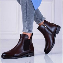 Brązowe zimowe płaskie botki damskie POTOCKI 12101. Brązowe botki POTOCKI, bez wzorów, ze skóry, bez obcasa, na obcasie, bez zapięcia. Za 229.00 zł.