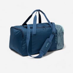Torba sportowa Kipsta Essential 55 l. Niebieskie torby podróżne Decathlon, bez wzorów, z materiału, na ramię, średnie. Za 69.99 zł.